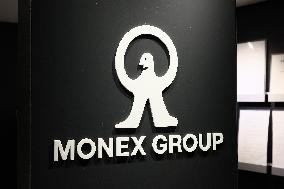 Monex Group's signage and logo